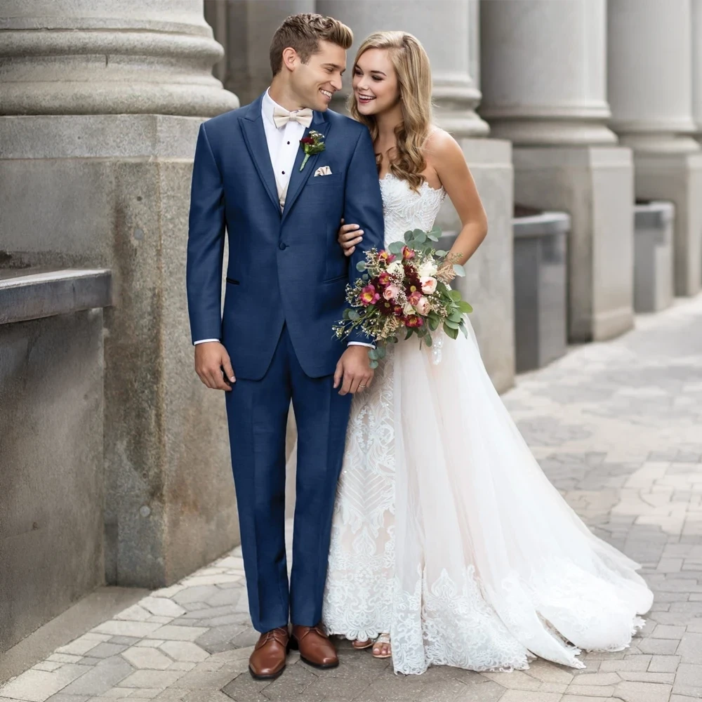 Model wearing a tuxedo.