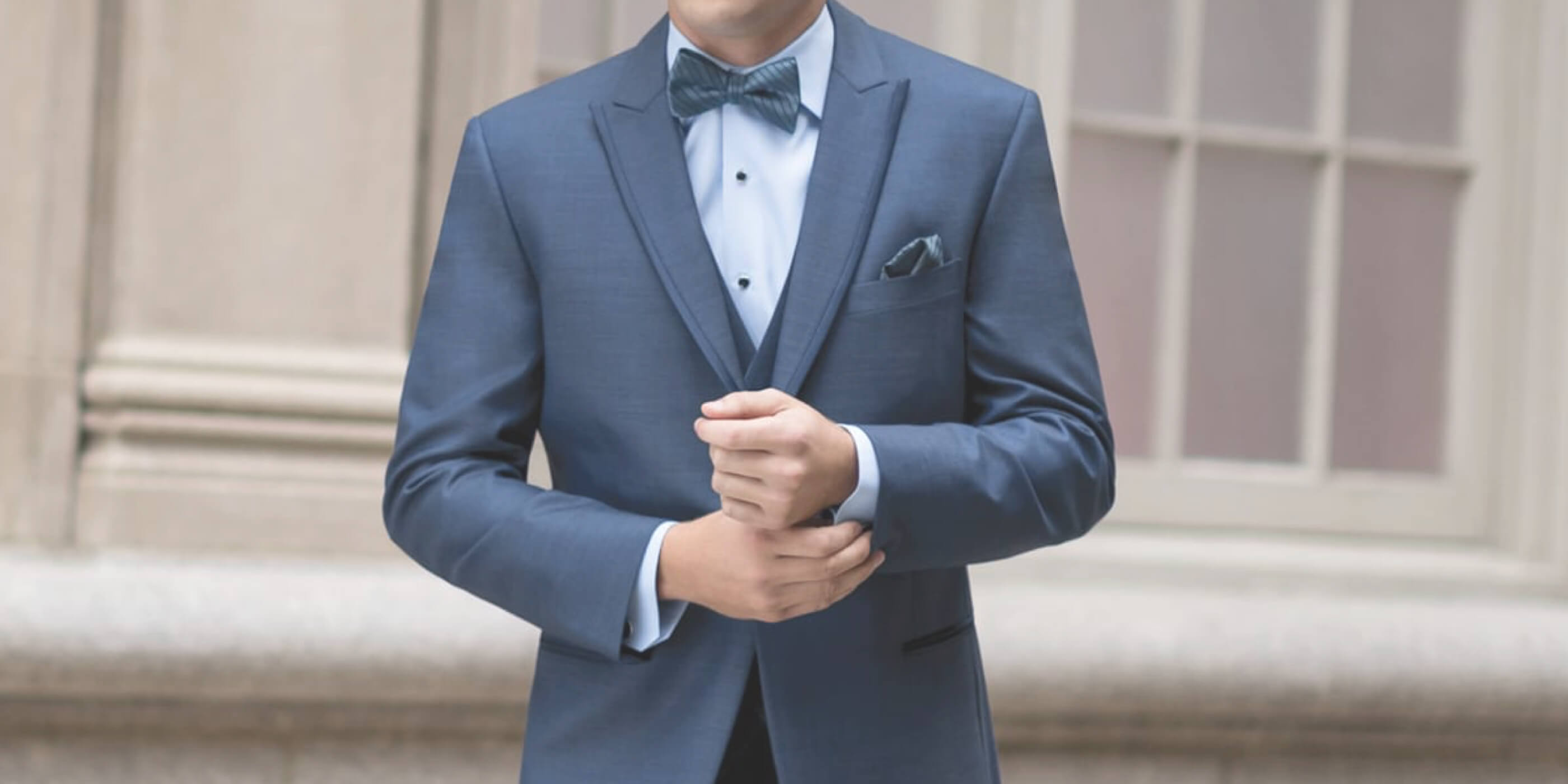 Model wearing a blue suit